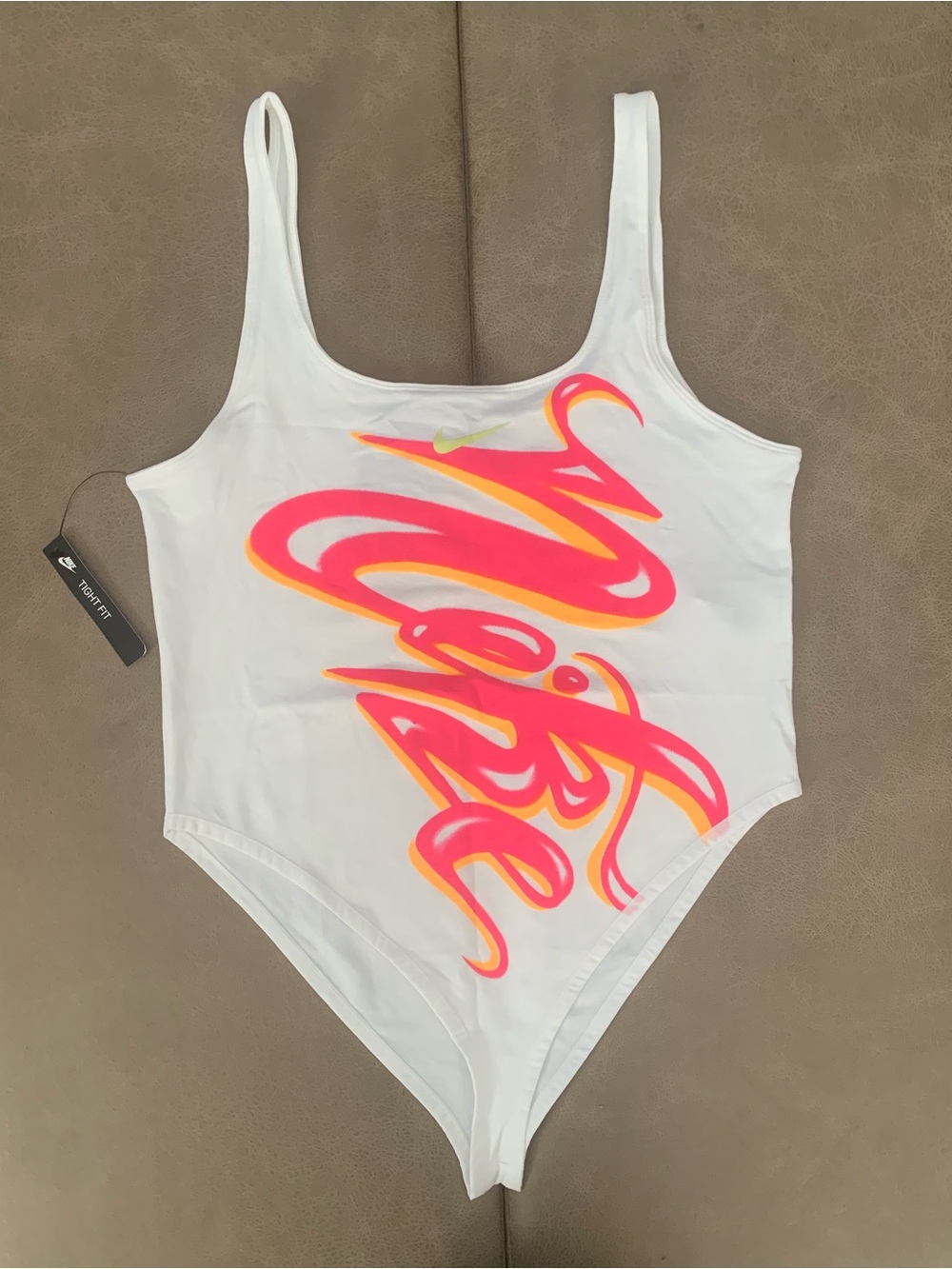 Nike Women’s White Pink Graffiti Logo Sleeveless Tight Fit Bodysuit NEW Size L